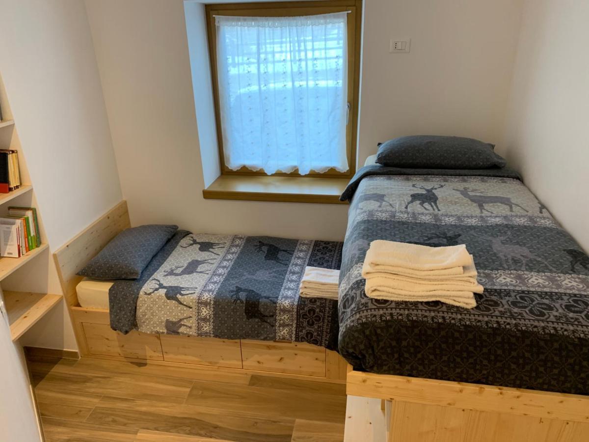 Ciasa De Rosa Apartment Pozza di Fassa Bagian luar foto